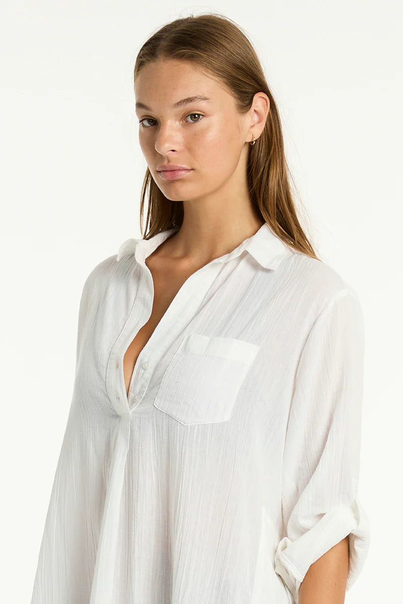  Salt collection is crafted from a super soft, light-weight cotton fabric and designed to throw over your swim and go, or dress up it up for an elevated resort wear look.

Relaxed fit
Button through
Side pockets
Fabric Composition:
100% Cotton