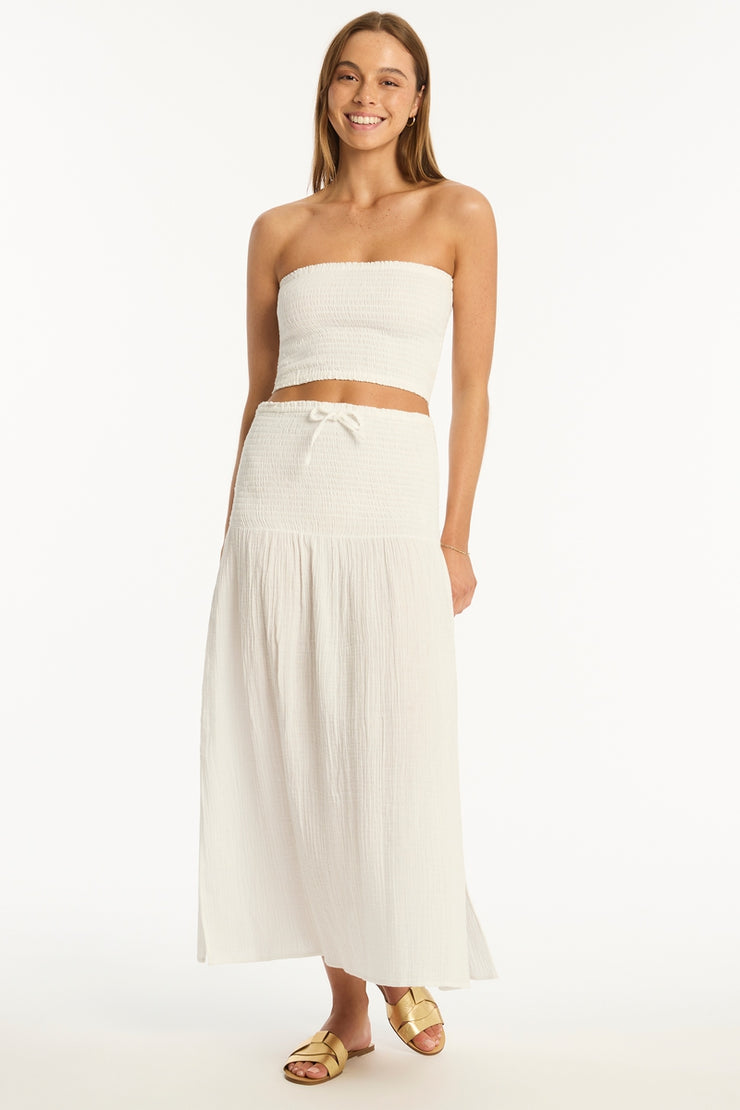 The ultimate wear-anywhere look for beachside cool and beyond. A perfect piece to layer over your favourite swim, or in mix-and-match colours for polished resort chic. Cotton cheesecloth fabric Shirred waist and hip panel Drawstring cord