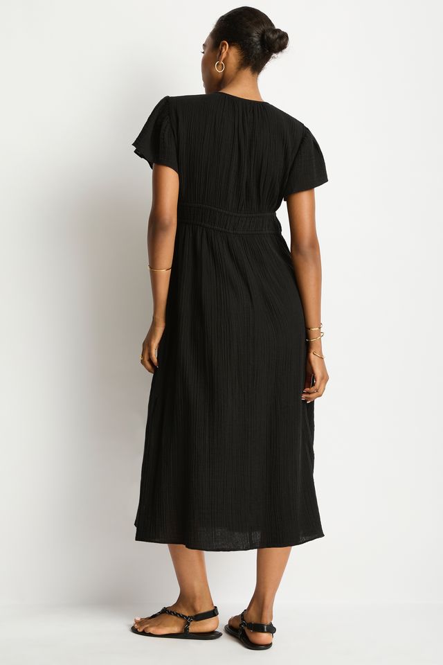 Cotton cheesecloth fabric

Soft touch fabric
V front neckline with tie
Elastic underbust panel
Short fluted sleeve
Maxi length