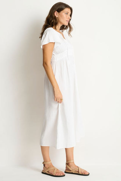 Cotton cheesecloth fabric

Soft touch fabric
V front neckline with tie
Elastic underbust panel
Short fluted sleeve
Maxi length