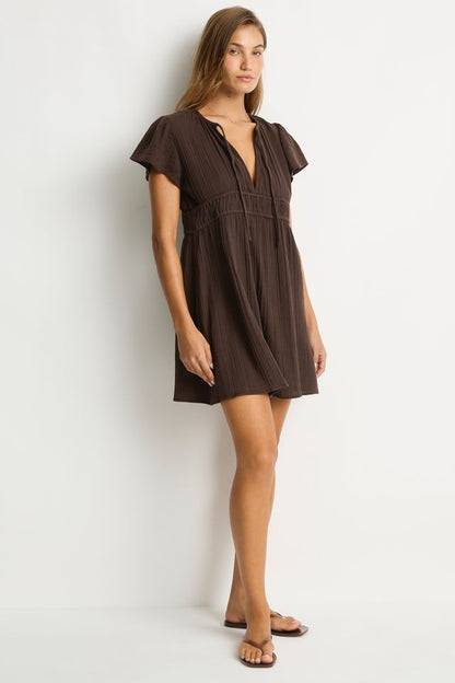 Cotton cheesecloth fabric
Soft touch fabric
V front neckline with tie
Elastic underbust panel
Short fluted sleeve