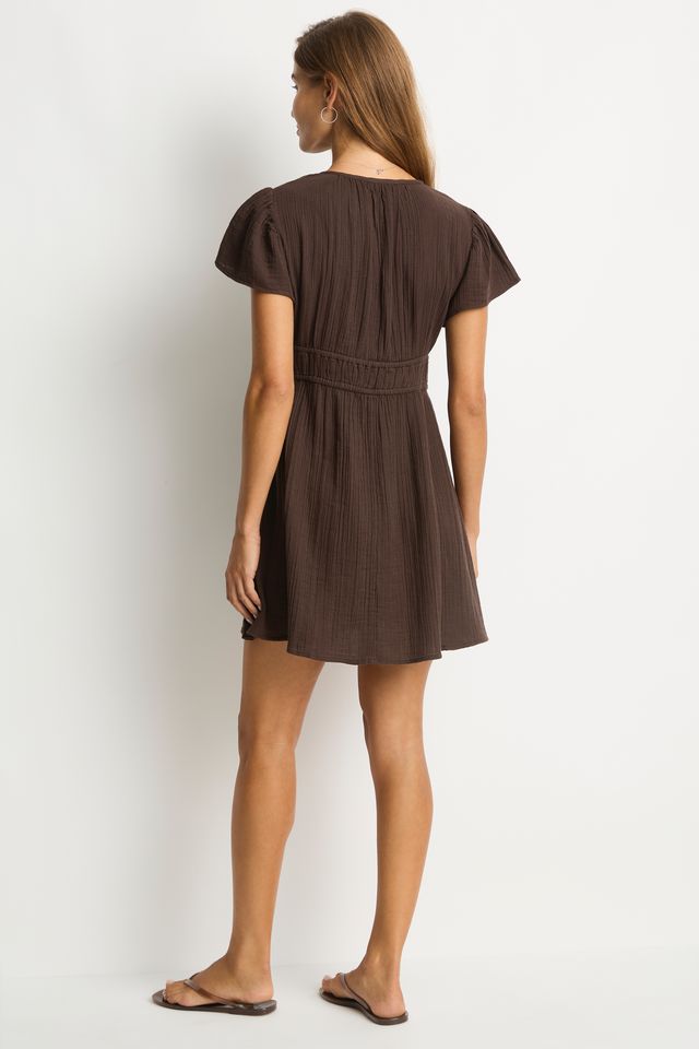 Cotton cheesecloth fabric
Soft touch fabric
V front neckline with tie
Elastic underbust panel
Short fluted sleeve