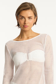 Premium lightweight stretch mesh that can be worn during the day over your swimsuit or at night with a slip. A reversible neckline gives you the option of a high or scooped look. Long sleeves.  Side splits. 