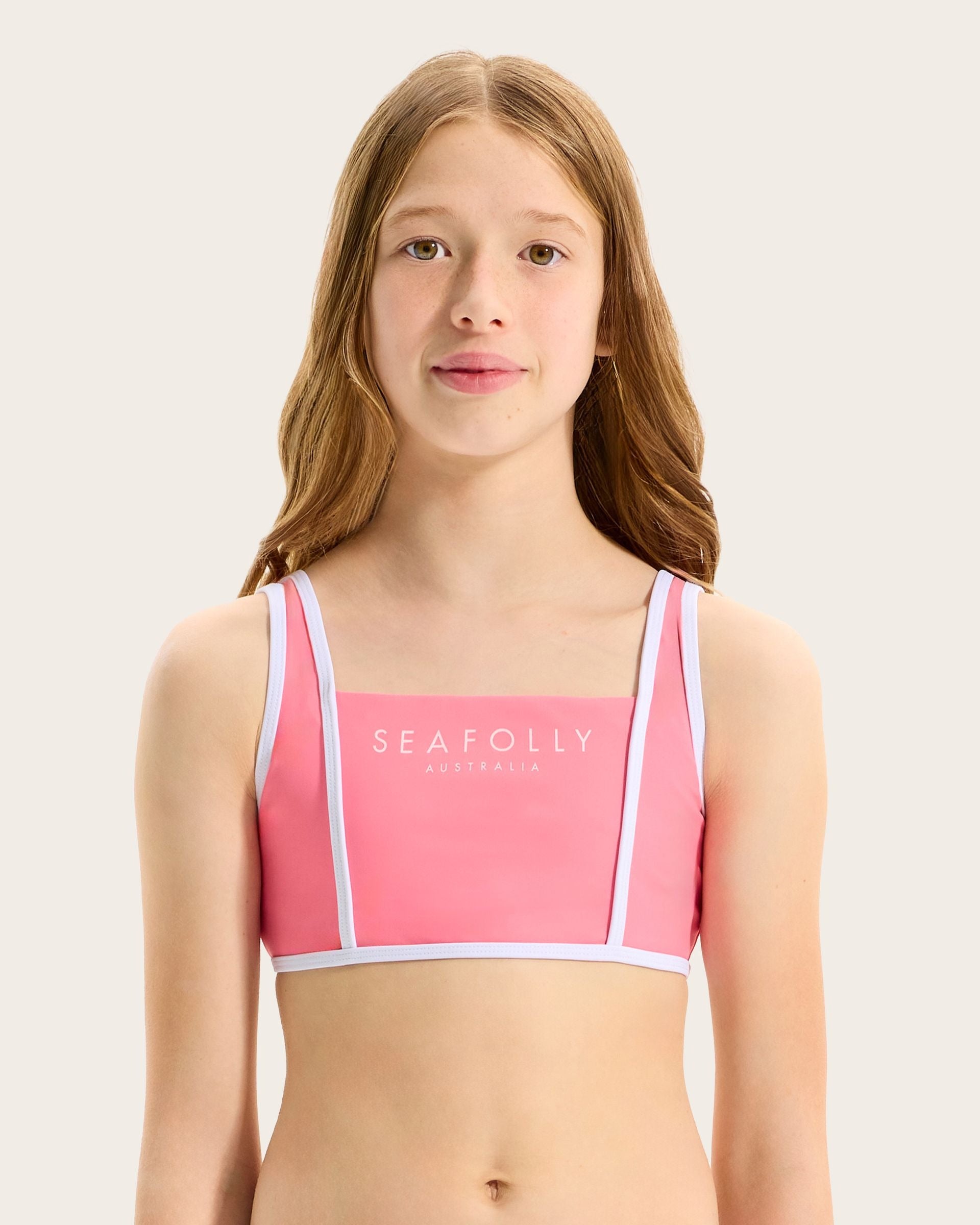 Crop top style
Contrasting piping detail
Wide, fixed shoulder straps
Seafolly Girls branding on front
Matching hipster pant