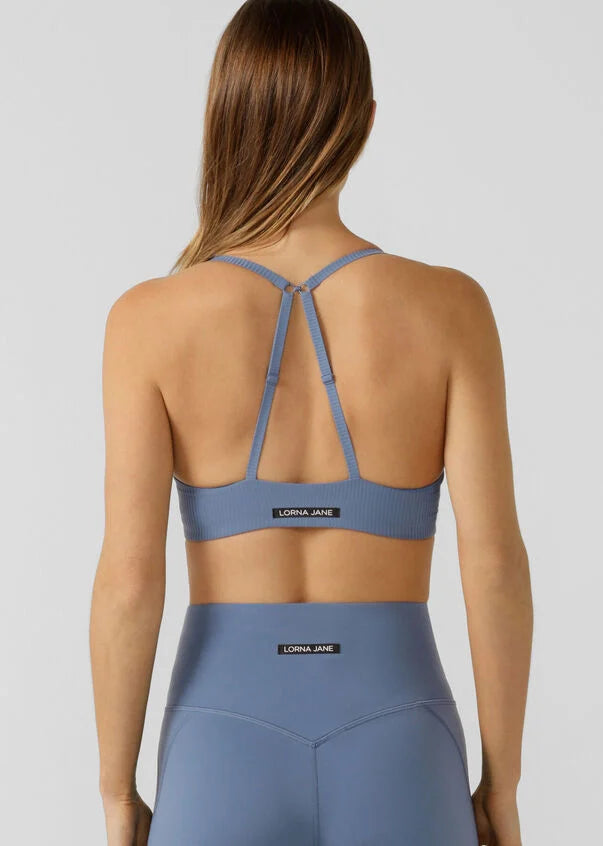 Experience all day support with our Supreme Comfort Aloe Sports Bra. Engineered for supreme comfort in premium aloe-infused active rib fabric, this bra features soft moulded foam cups for natural shape and support, slimline bonded adjustable straps you can wear over the shoulders or clipped together.