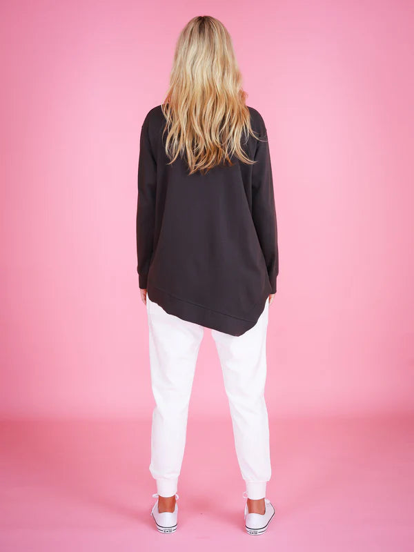 The Newhaven is 3rd Story's popular classic over-sized, asymmetrical sweater. Featuring dropped shoulders and an asymmetrical back hem, it offers a relaxed fit with ribbed banding at the crew neck, cuffs and hem.