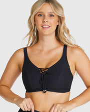 Baku's Rococco E/F Lace Up Bra features a flattering dropped neckline with lace up detailing at the front. It also features hidden wire, boning and lycra cup support, with adjustable and convertible straps and a clip back