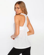 Designed in a relaxed fit, this lightweight racer back tank with a higher neckline is perfect for all your summer workouts. Designed with added coverage at the front means you can stay focused on your workouts as the intensity steps up. 