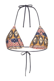 The Yara Reversible Tri Bikini Top is fully reversible with the handcrafted details we are known for. Delicate tonal embroidery stitch panels with blanket stitch around the outer edge. Wear it print or reverse to classic Khaki.  Fits an A Cup up to a C Cup Bust fitting Adjustable halter and back ties in Khaki Tonal embroidery stitch and blanket stitch detail on both the print and plain