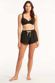 Elasticated waistband with drawcord (drawstring is black not white as pictured) 4-way stretch for ease of movement Signature trims No brief built in This is an eco-friendly style! Made from: 97% ECO Recycled Polyester / 3% Elastane